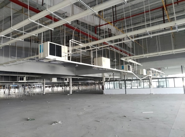 大型制衣廠降溫應(yīng)用蒸發(fā)冷省電空調(diào)-臥式軸流機